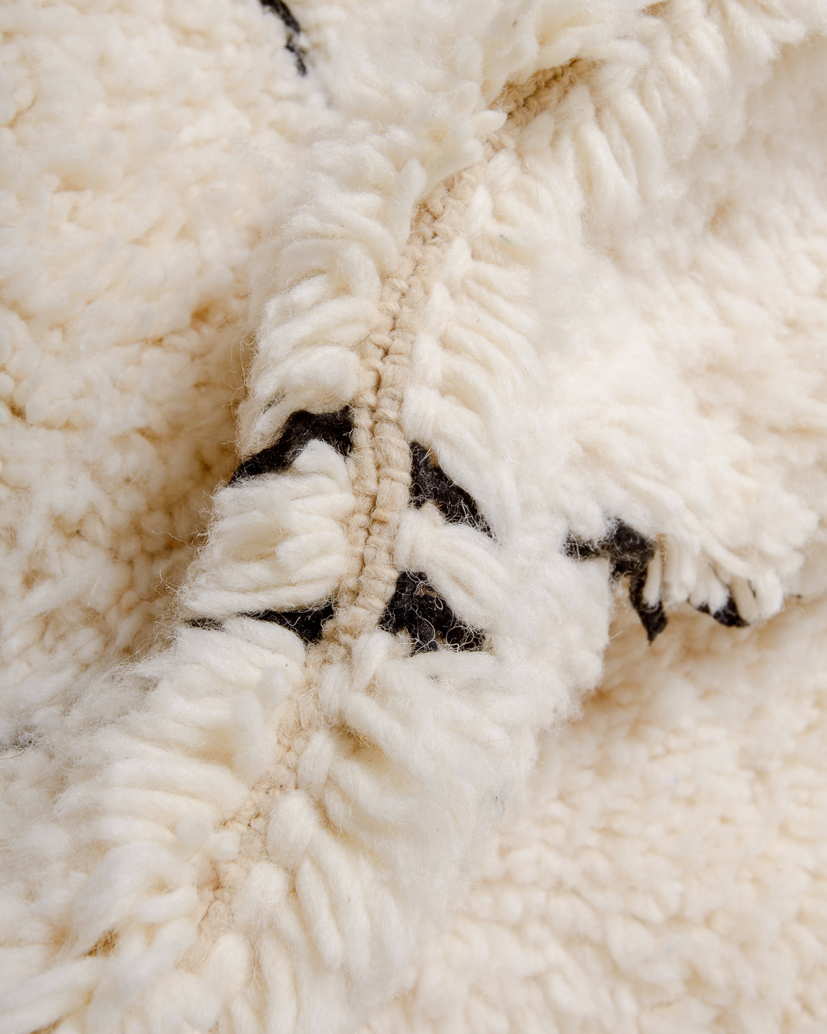 Close up of Beniourain rug showing density and thickness of wool.
